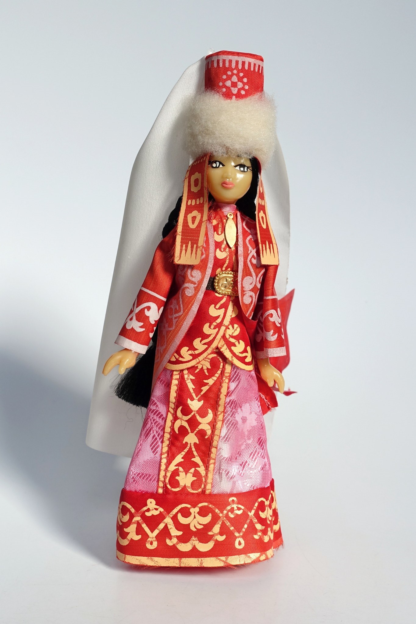Porcelain doll Kazakh man in folk costume 